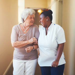 a female caregiver with a senior woman